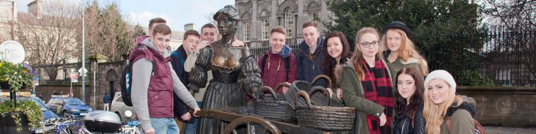 Group with Molly Malone Statue in Ireland