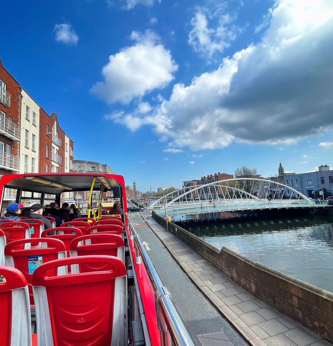 Open-Top Bus on the River bank