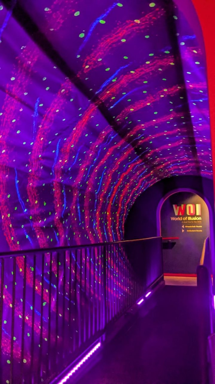 Purple Lights Spinning in the tunnel shaped room in world of illusion