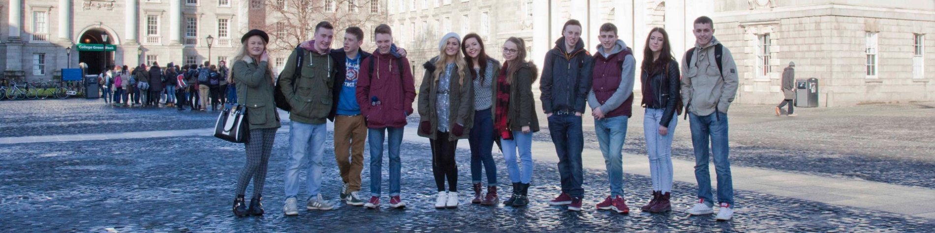 Group of students on a tour in Dublin - visiting Trinity College