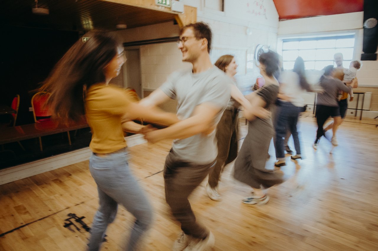 Boys and Girls Dancing Around  in a hall