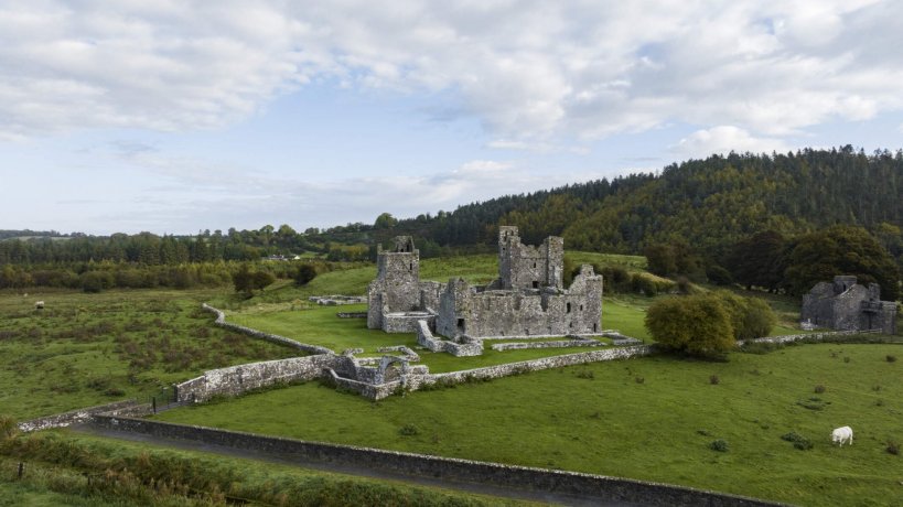 Aerial View of the Fore Abbey with Green Woodland Covering Hill