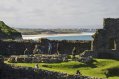 Dunluce Castle Courtyard with a View of Beaches 
