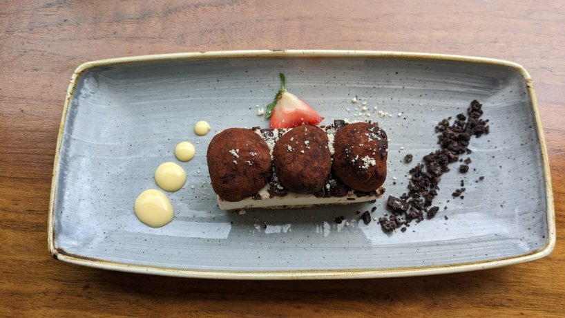 Chocolate Tart served with Raspberry Sorbet. Inexpensive food in Dublin restaurant