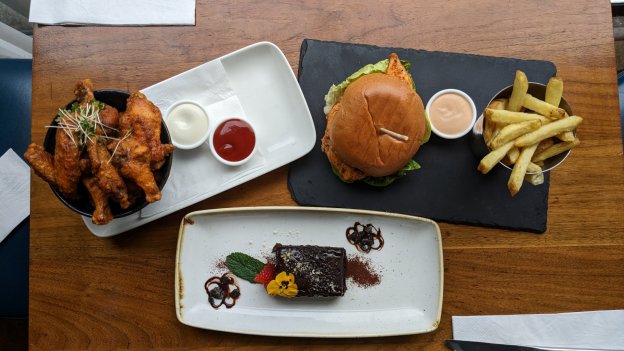 Harbourmaster Specialty Chicken Wings, Chicken burger served with Toasted Brioche bun and fries, Brownie served Chocolate Sauce. Affordable 3 course meals for groups