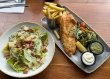 Beer Battered Fillet of Today’s Catch, served with Chips and a Classic Caesar Salad. Affordable 2 course dinners for groups 