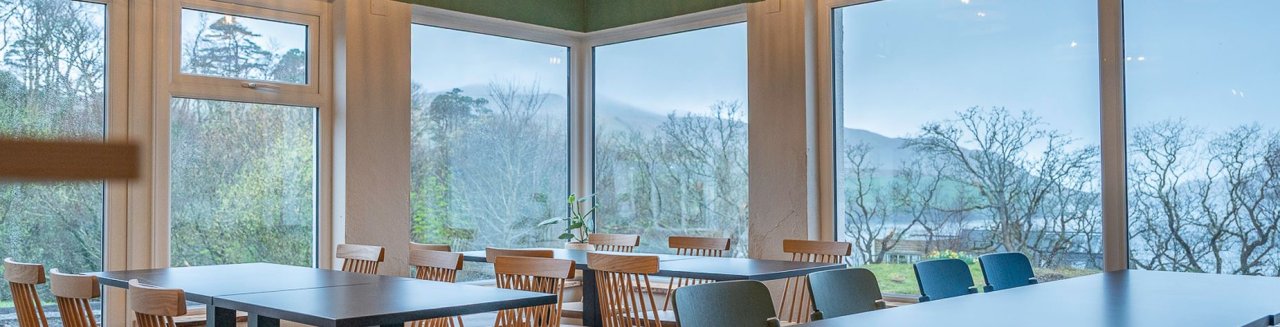 View of the hills in Connemara through the glass wall of the student groups hostel dining hall
