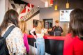 Group of Tourists in Hostel - Reception Area