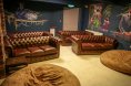 Group Cinema Room with sofas and bean bags at the Abbey Court in Dublin