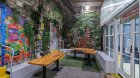 Abbey Court Hostel Dublin View of Colourful Outside Patio with benches and tables