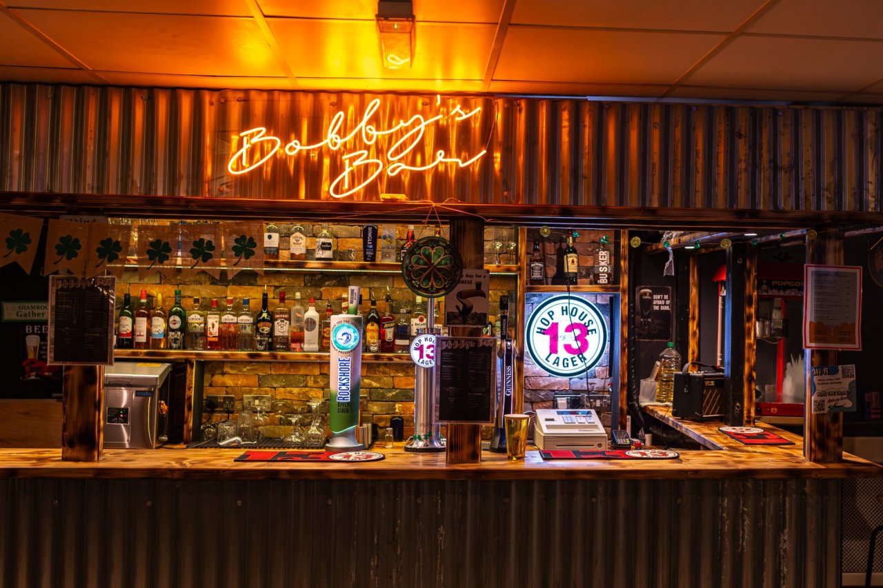Bar Top and Shelves with Drinks in Bobby's Bar in Abbey Court Hostel