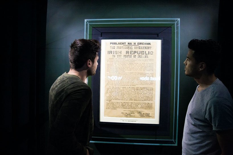 Tourists reading a display at the GPO Museum